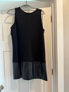 Black Sleeveless Shift Dress with Faux Leather Hem